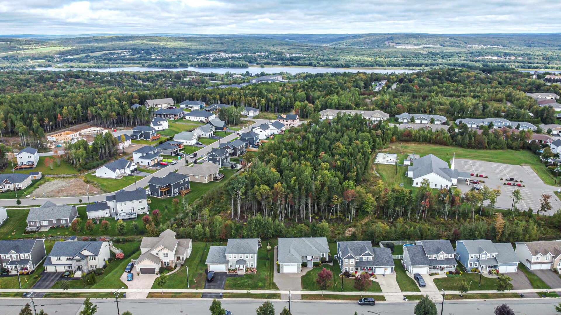 Aerial view of a suburban neighbourhood at 154 Morning Gate Drive in Fredericton New Brunswick