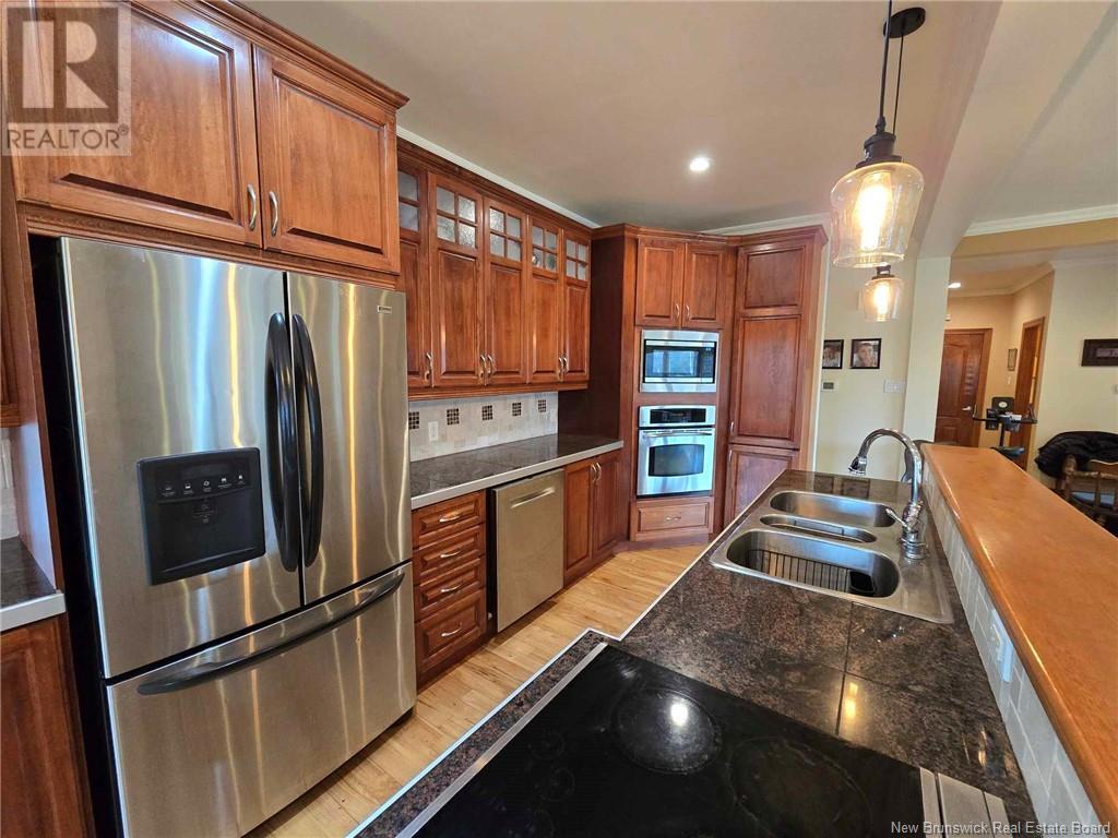 1142 Rue Bryar, Beresford, New Brunswick  E8K 1B5 - Photo 15 - NB116920