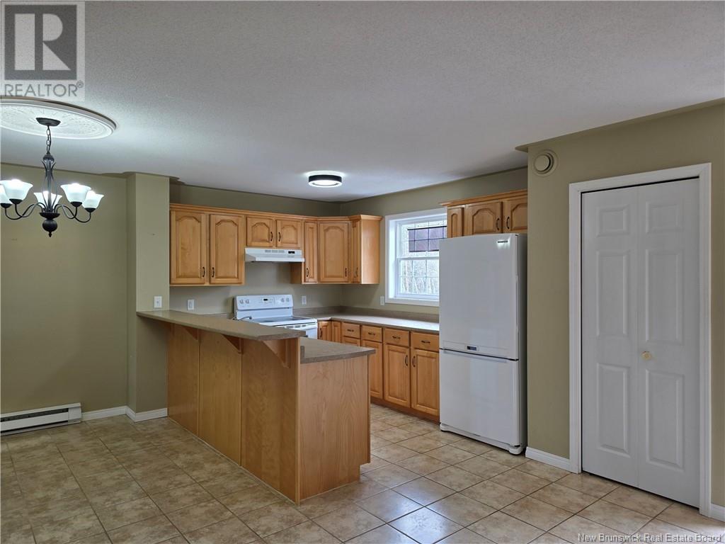 703 Brookside Drive, Fredericton, New Brunswick  E3G 8T9 - Photo 2 - NB118069