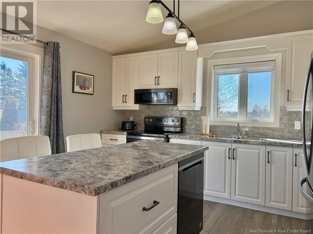 784 St Pierre, Beresford, New Brunswick  E8K 1S1 - Photo 13 - NB118441