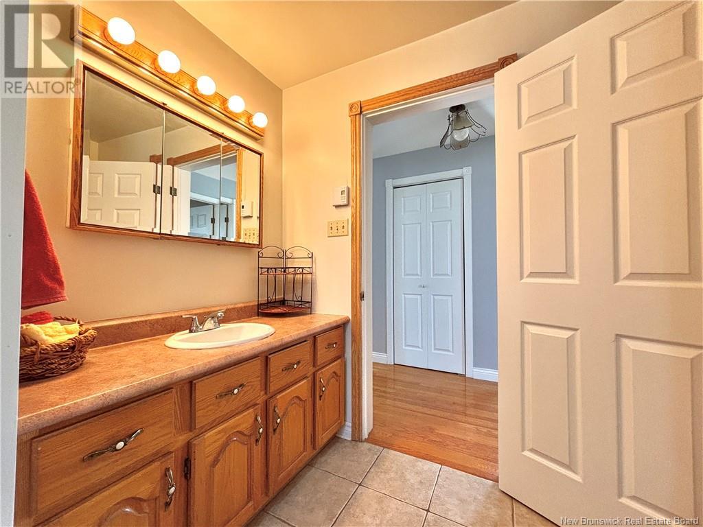 784 St Pierre, Beresford, New Brunswick  E8K 1S1 - Photo 18 - NB118441