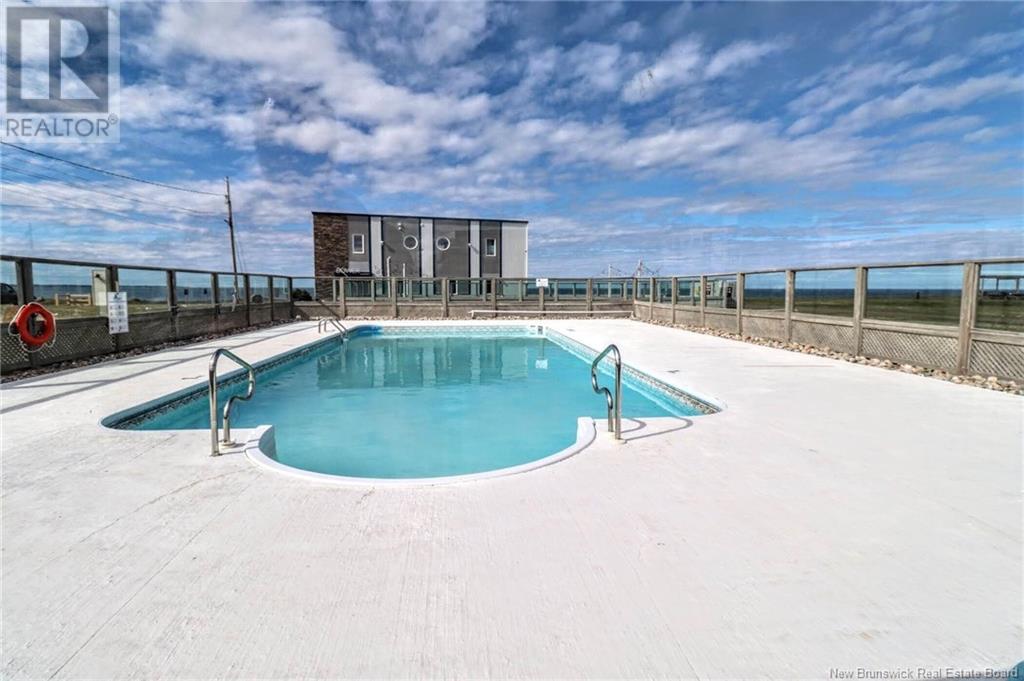 69 Cap Bimet Boulevard Unit# 216, Beaubassin East, New Brunswick  E4P 6X5 - Photo 34 - NB118241