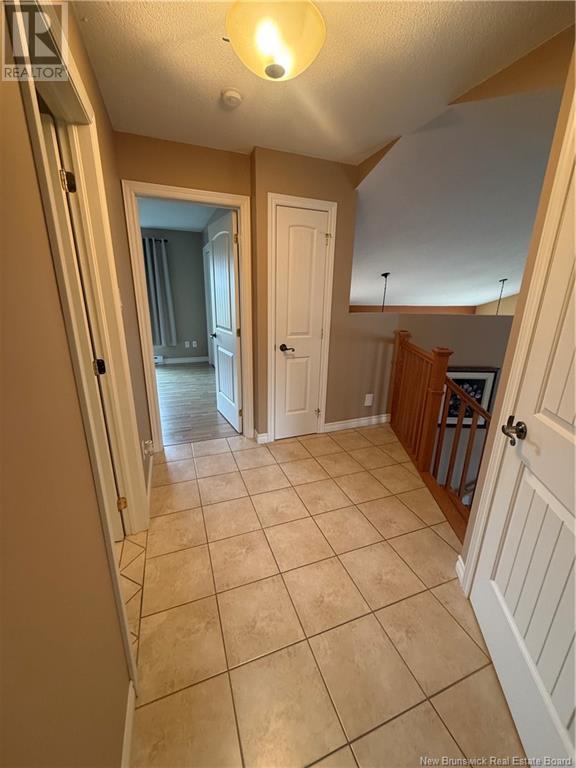 249-251 Du Parc, Beresford, New Brunswick  E8K 2E9 - Photo 10 - NB118775