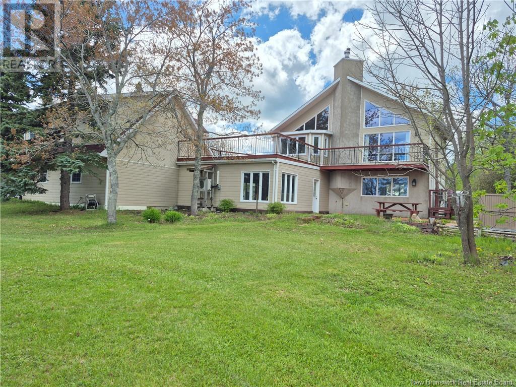 619 Rue De La Baie, Beresford, New Brunswick  E8K 1X3 - Photo 1 - NB119634