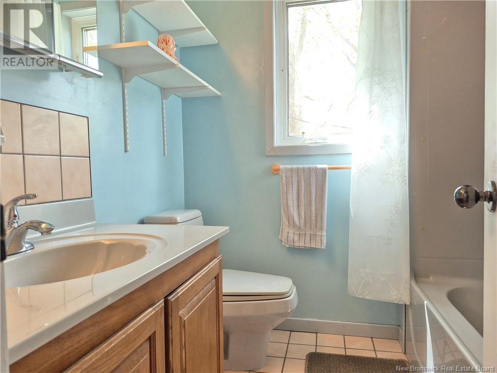 619 Rue De La Baie, Beresford, New Brunswick  E8K 1X3 - Photo 18 - NB119634
