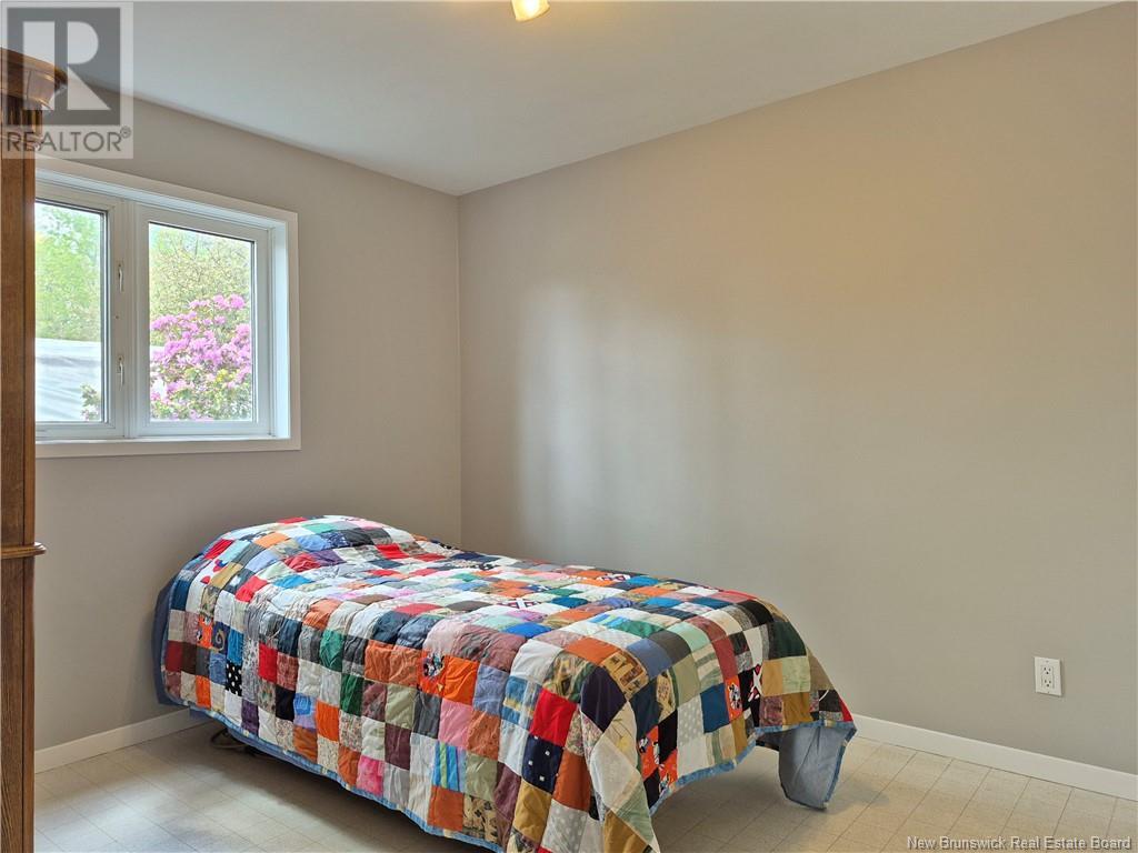 619 Rue De La Baie, Beresford, New Brunswick  E8K 1X3 - Photo 29 - NB119634