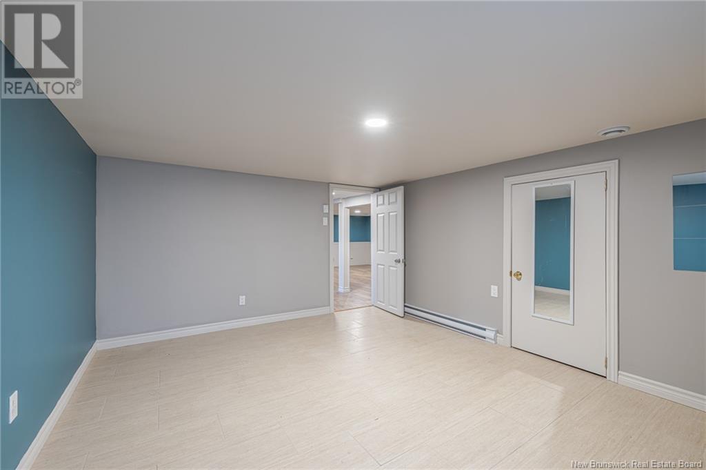 653 Rue Principale, Beresford, New Brunswick  E8K 3X5 - Photo 41 - NB119981