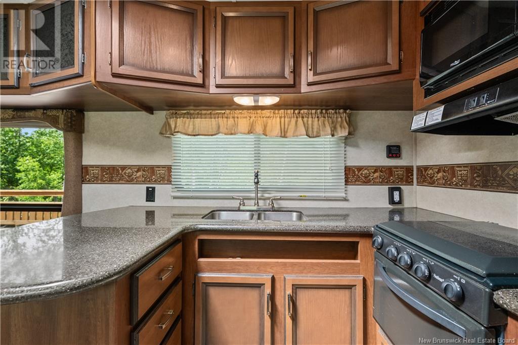 16 Modeste, Trois Ruisseaux, New Brunswick  E4N 2X3 - Photo 15 - NB121635