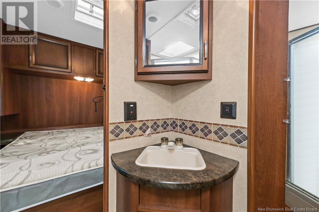 16 Modeste, Trois Ruisseaux, New Brunswick  E4N 2X3 - Photo 18 - NB121635