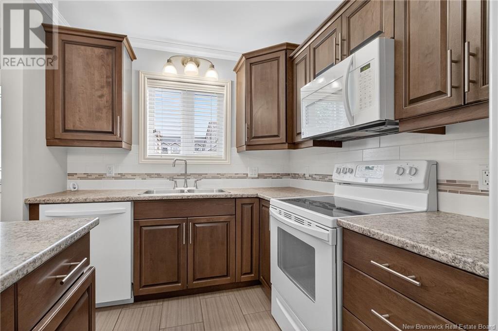 331 Mclaughlin Drive Unit# 8, Moncton, New Brunswick  E1A 4R3 - Photo 2 - NB121750