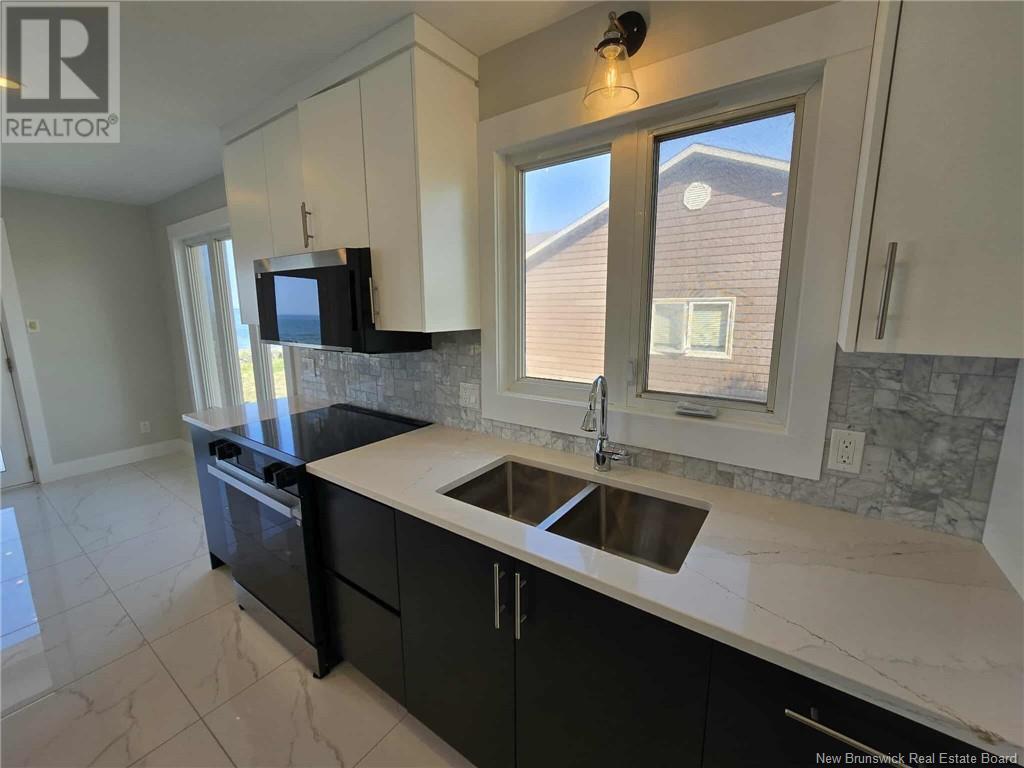 1185 Jacques Cartier Street, Beresford, New Brunswick  E8K 1A6 - Photo 9 - NB122843