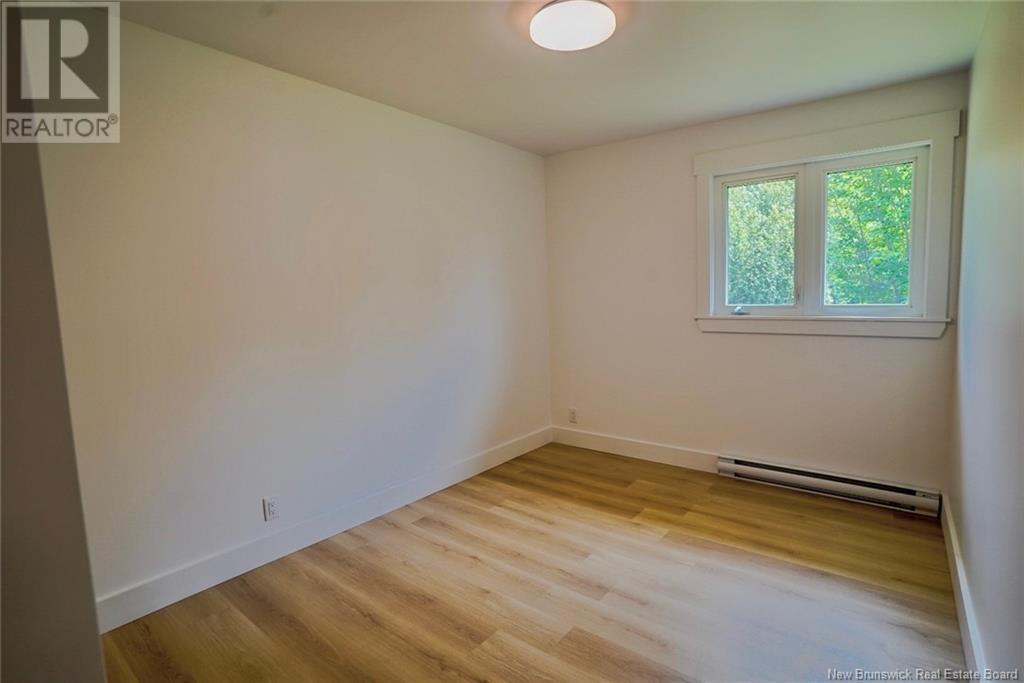 221 Rue Parc E, Beresford, New Brunswick  E8K 1V9 - Photo 22 - NB122968