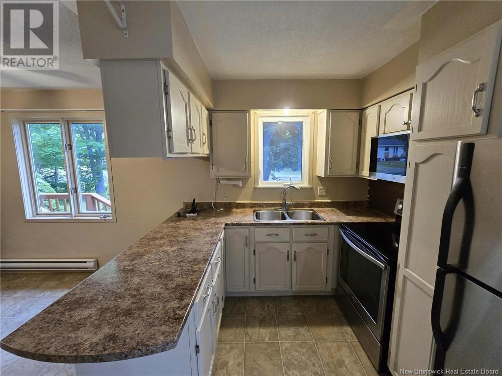 169 Kent Lodge Street, Beresford, New Brunswick  E8K 1A3 - Photo 13 - NB123246