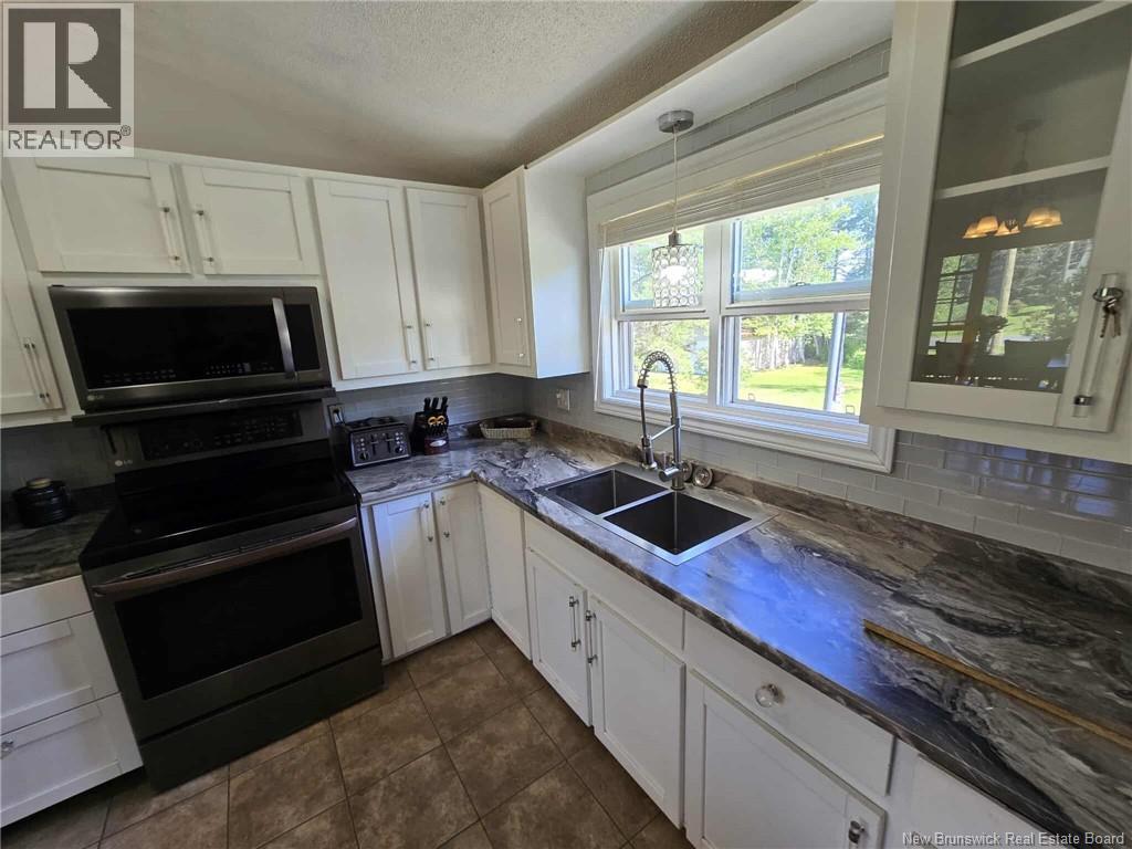 363 Heritage Street, Beresford, New Brunswick  E8K 2C7 - Photo 12 - NB124320
