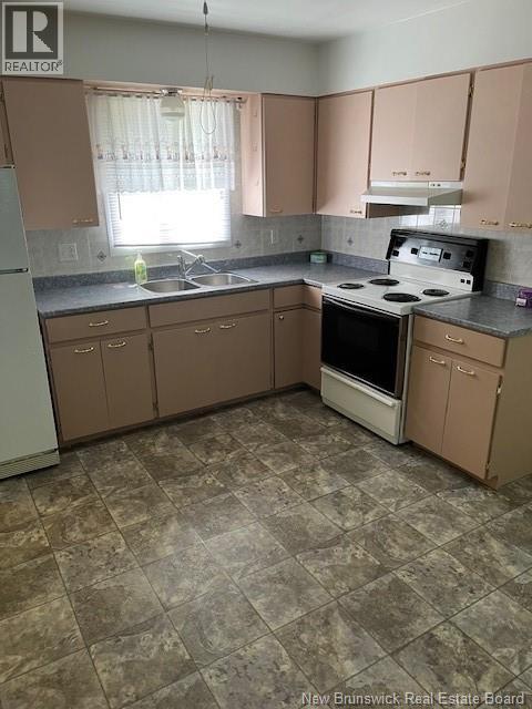 14 Kennedy Street, Charlo, New Brunswick  E8E 2M2 - Photo 4 - NB124383