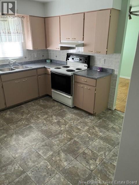 14 Kennedy Street, Charlo, New Brunswick  E8E 2M2 - Photo 5 - NB124383