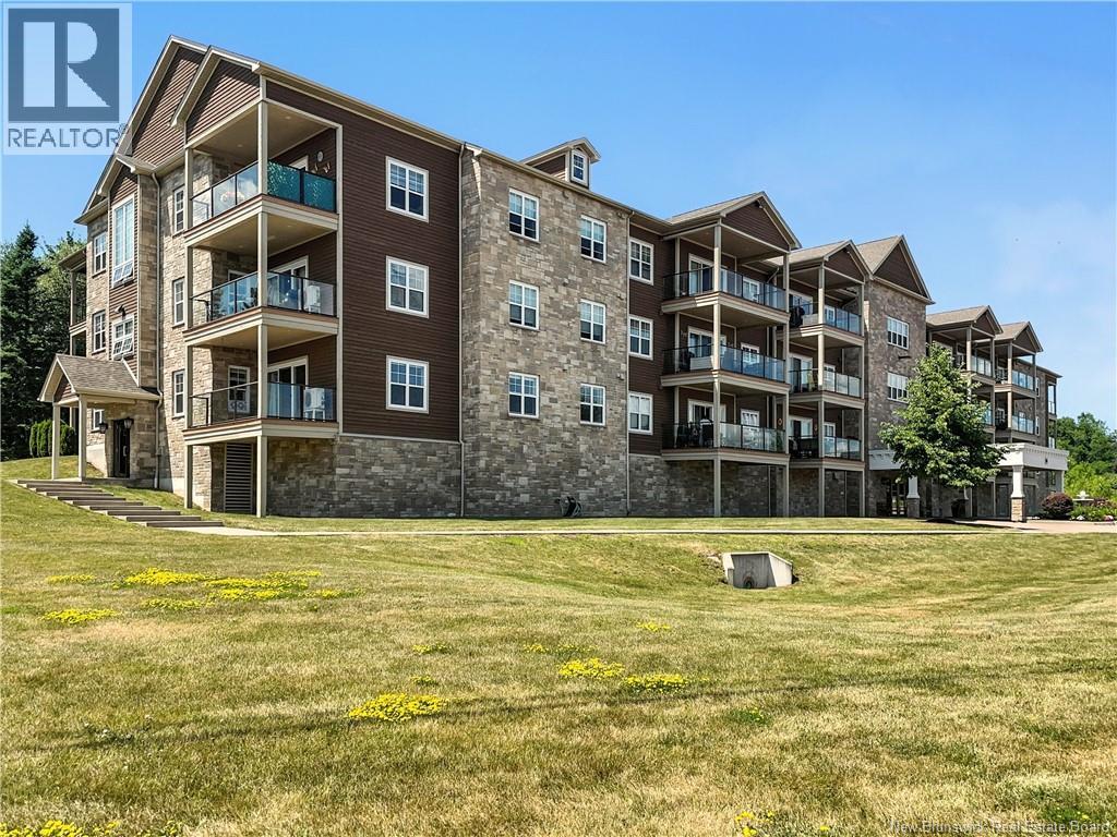 88 Woods Terrace Unit# 402, Moncton, New Brunswick  E1G 1X6 - Photo 1 - NB124429