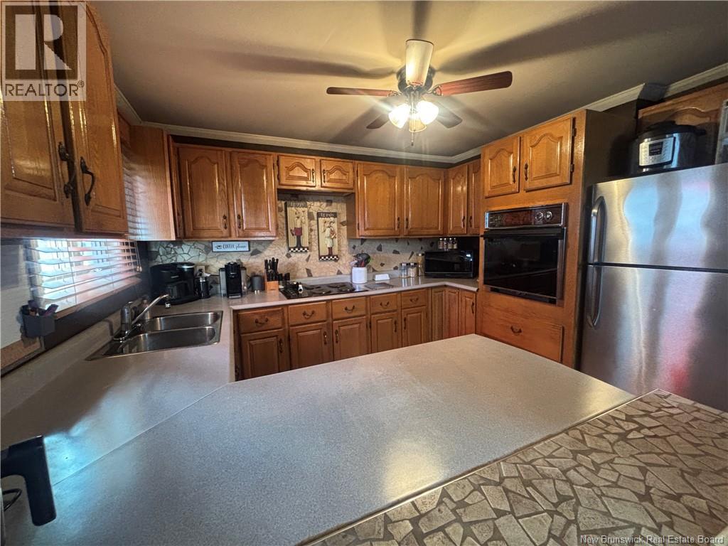 676 Rue Principale, Beresford, New Brunswick  E8K 2Y1 - Photo 34 - NB126011
