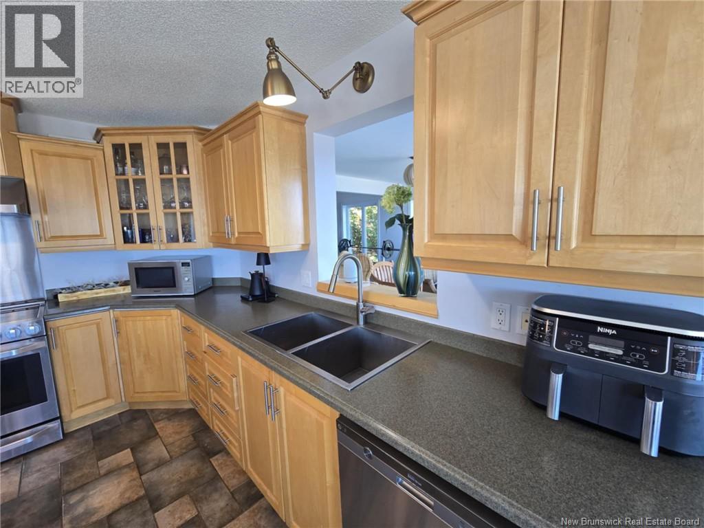 623 Baie Street, Beresford, New Brunswick  E8K 1X3 - Photo 21 - NB126081