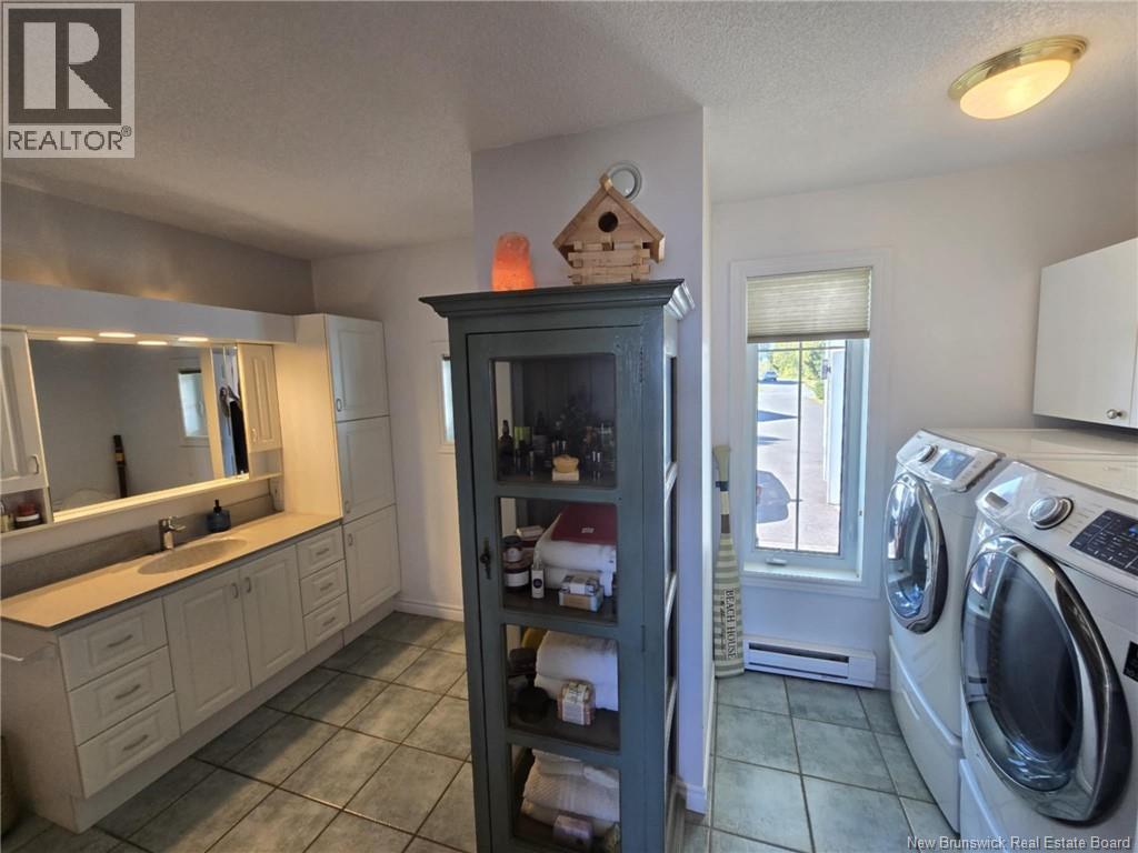 623 Baie Street, Beresford, New Brunswick  E8K 1X3 - Photo 32 - NB126081
