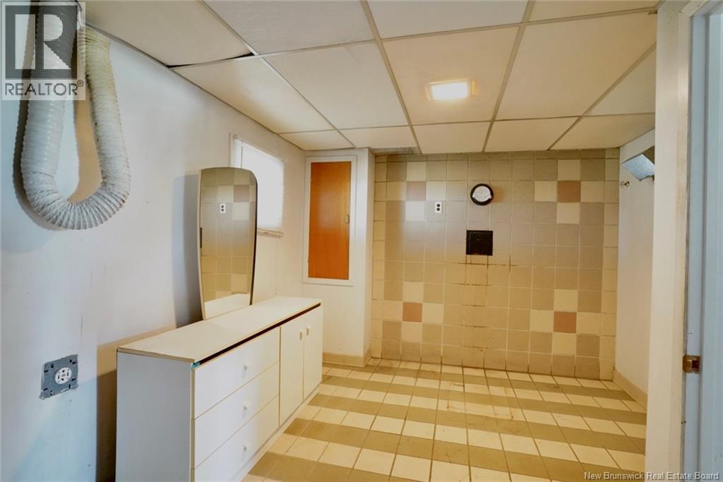 629 Rue Principale, Beresford, New Brunswick  E8K 1X6 - Photo 28 - NB125951