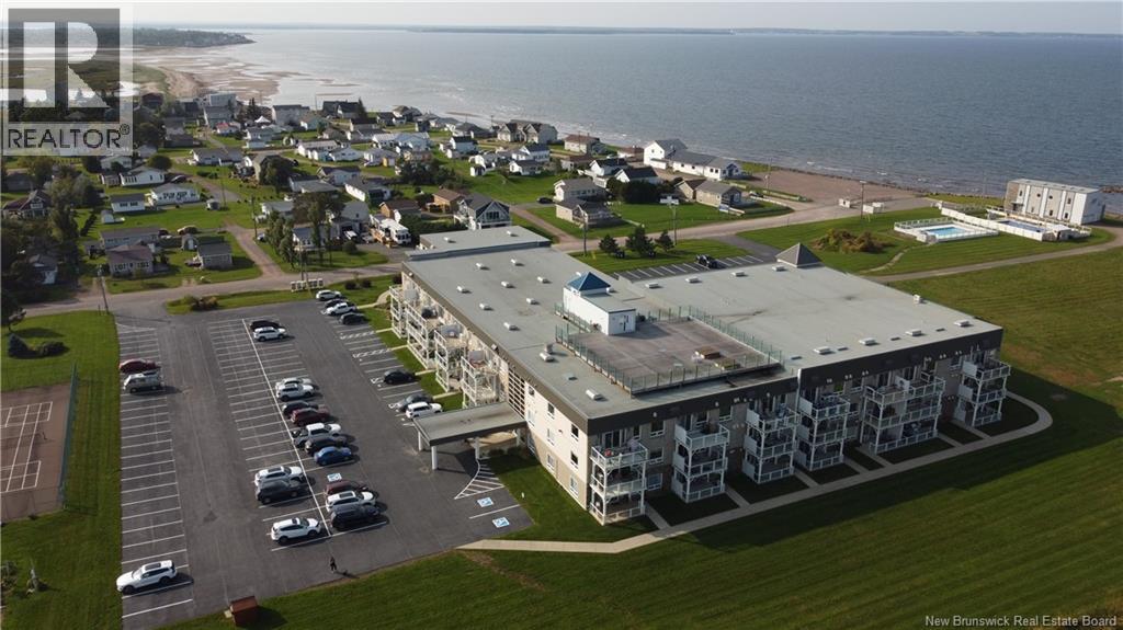 69 Cap Bimet Boulevard Unit# 219, Grand-Barachois, New Brunswick  E4P 6X5 - Photo 3 - NB126325