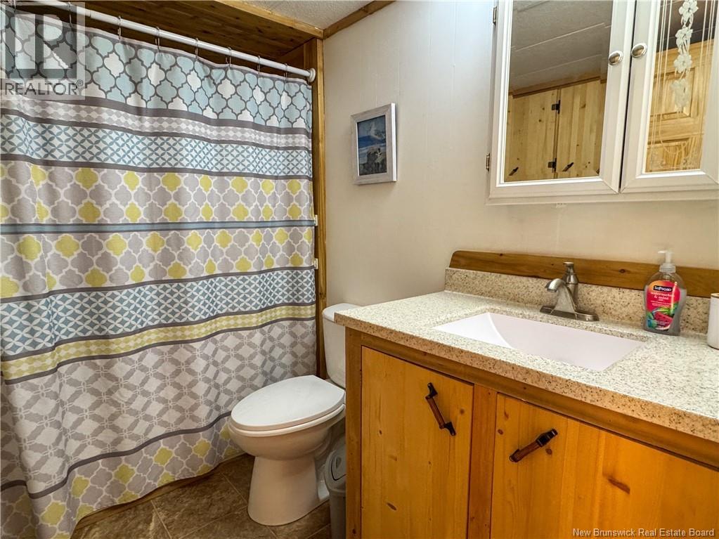 57 Allee Des Chalets, Petit-Rocher, New Brunswick  E8J 1M4 - Photo 11 - NB128425