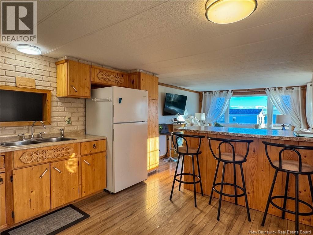 57 Allee Des Chalets, Petit-Rocher, New Brunswick  E8J 1M4 - Photo 4 - NB128425