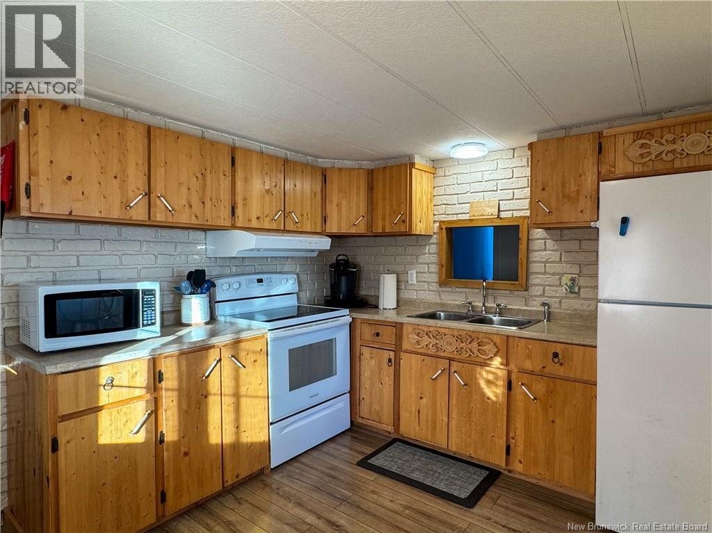 57 Allee Des Chalets, Petit-Rocher, New Brunswick  E8J 1M4 - Photo 5 - NB128425
