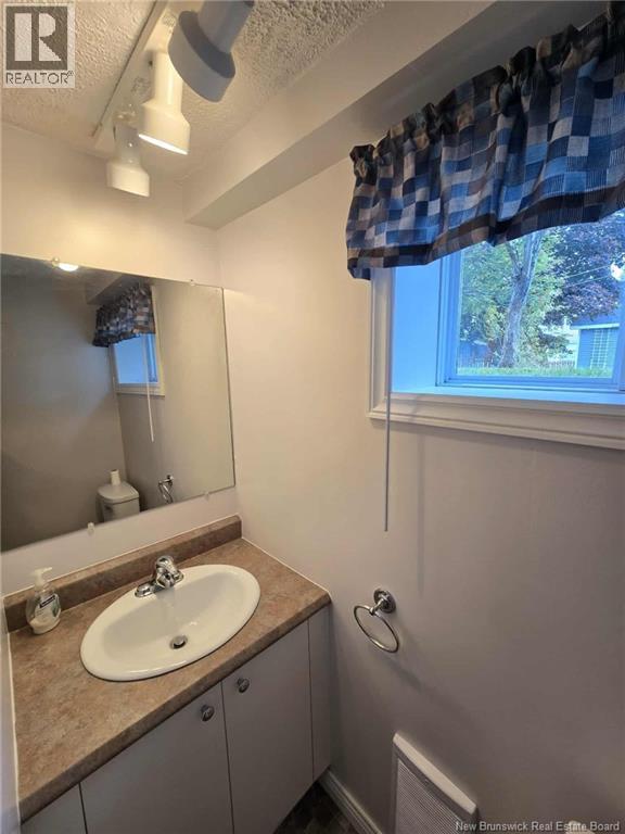 232 Aimee Street, Beresford, New Brunswick  E8K 1L9 - Photo 41 - NB128531