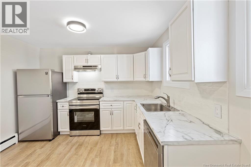 25-27 Whitney Avenue, Moncton, New Brunswick E1C 8C5 - Photo 2 - NB130641