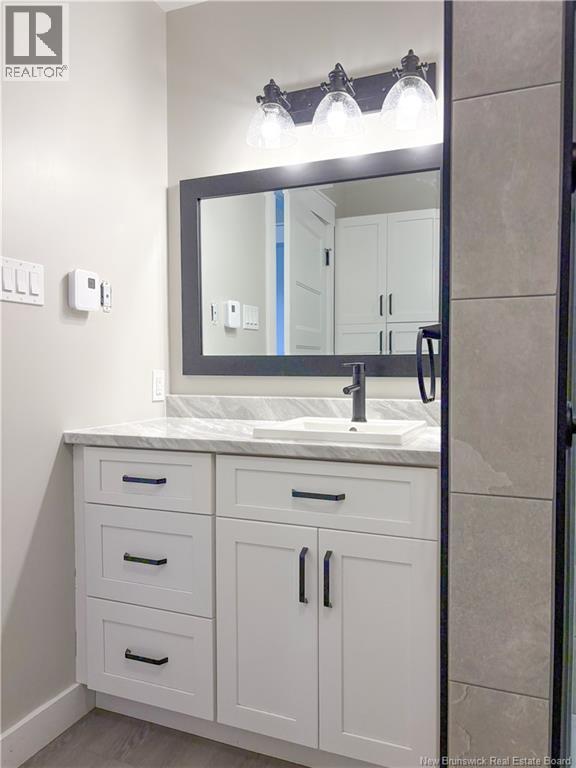 24 Riverview Drive Unit# 104, Somerville, New Brunswick  E7P 3B4 - Photo 22 - NB130666