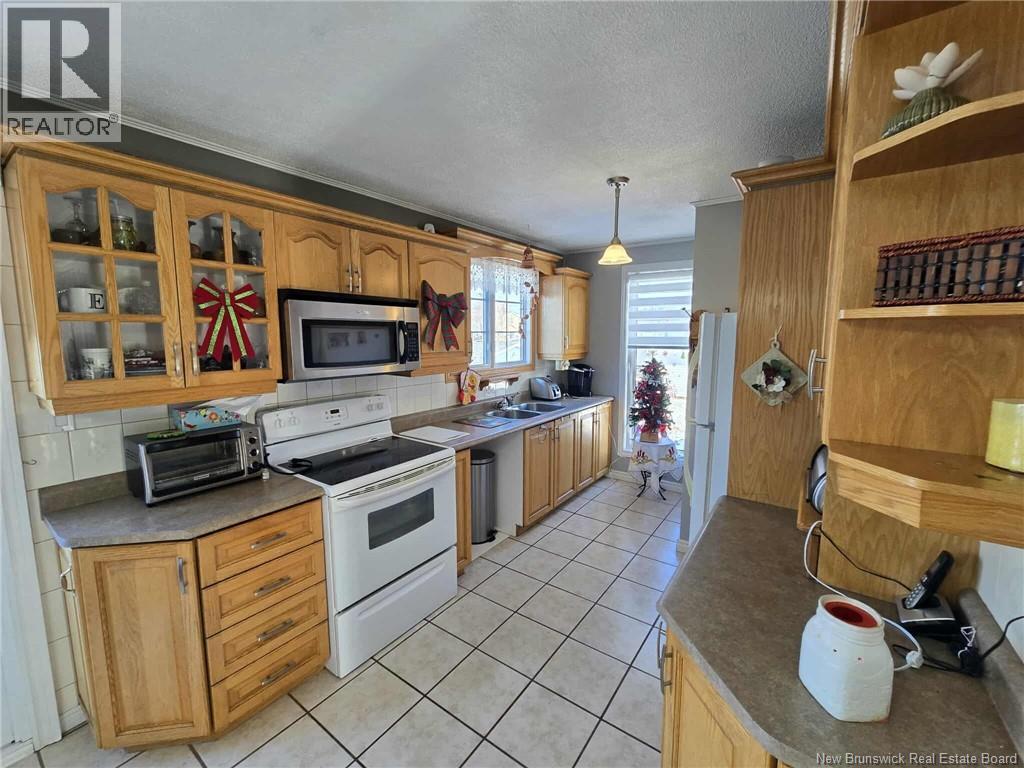 210 Francine, Beresford, New Brunswick  E8K 1N8 - Photo 2 - NB131137