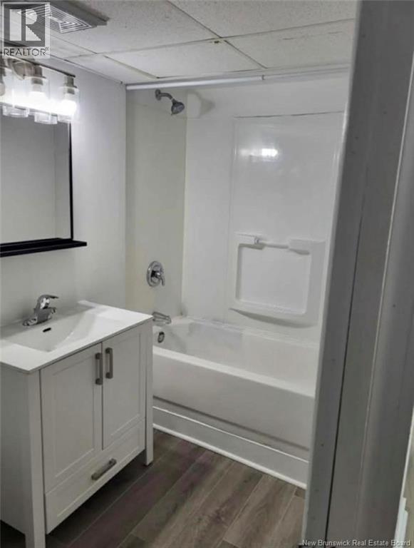 292 Parc Ouest Street, Beresford, New Brunswick  E8K 2E8 - Photo 23 - NB133125