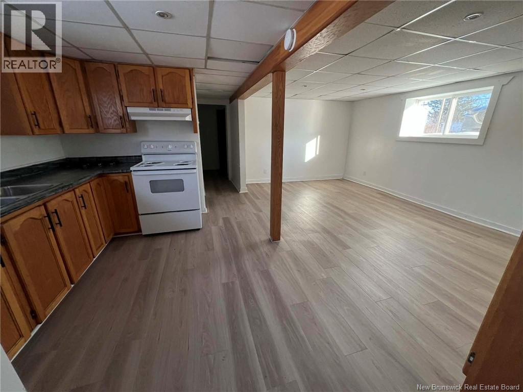 292 Parc Ouest Street, Beresford, New Brunswick  E8K 2E8 - Photo 30 - NB133125