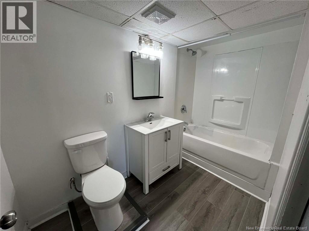 292 Parc Ouest Street, Beresford, New Brunswick  E8K 2E8 - Photo 31 - NB133125