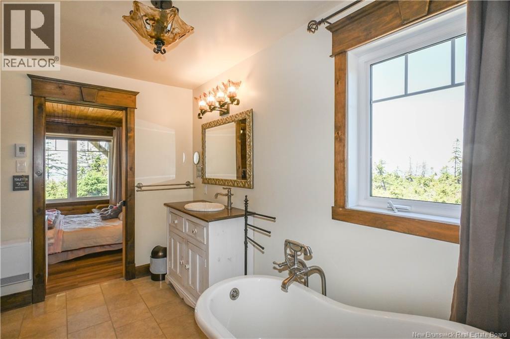 449 Gauvin Street, Petite-Lamèque, New Brunswick  E8T 2N2 - Photo 36 - NB142380